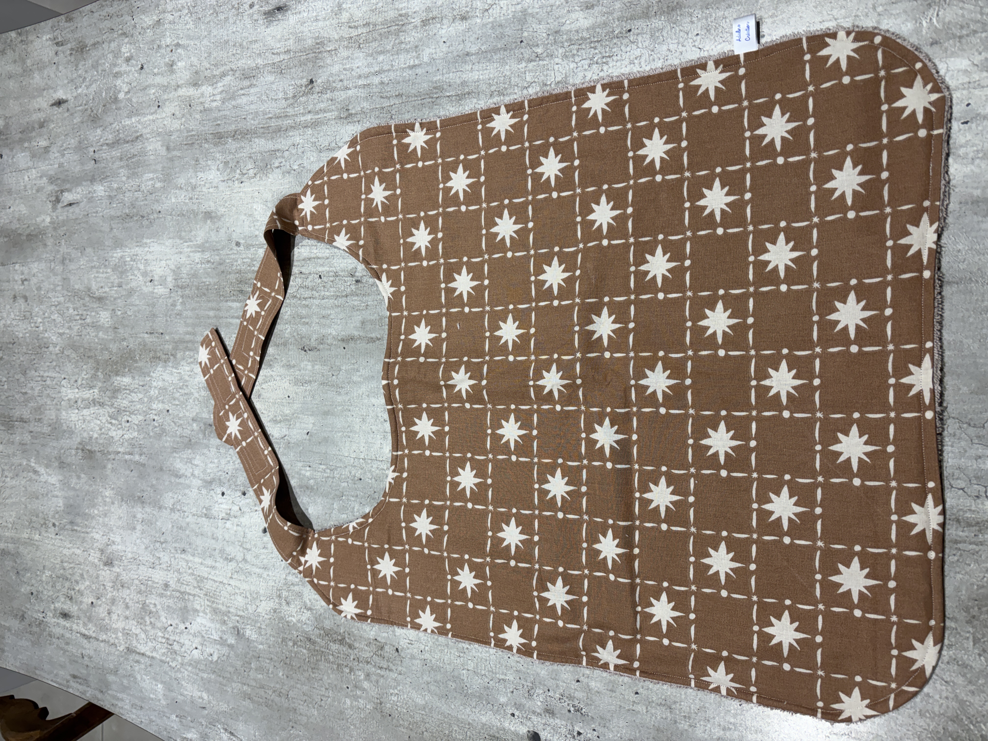 Serviette adulte (bavoir) éponge